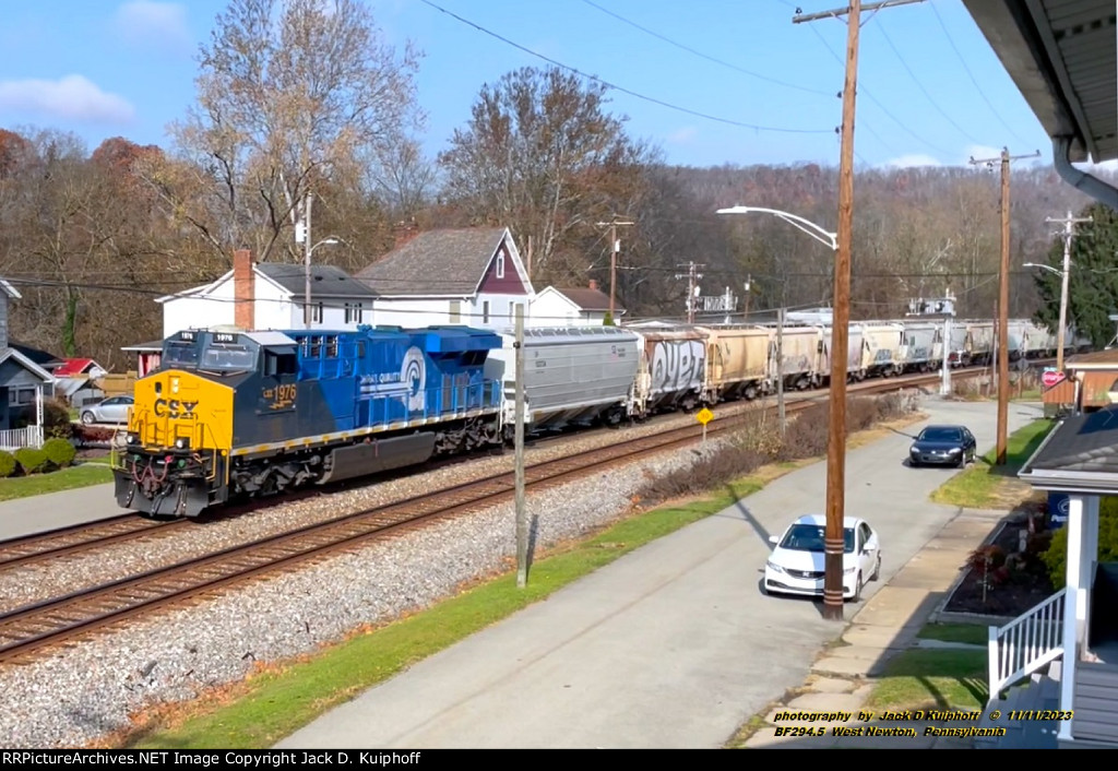 CSX 1976 (CR), with eastbound M322 on the CSX Pittsburgh sub, West Newton, Pennsylvania. November 11, 2023. 